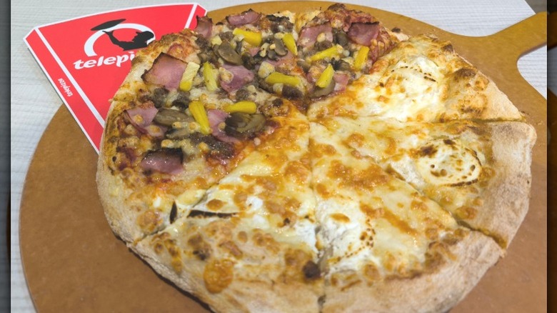 Half cheese and half Hawaiian pizza from Telepizza restaurant chain