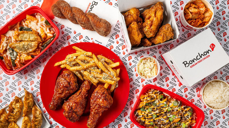 an array of foods from Bonchon on a table