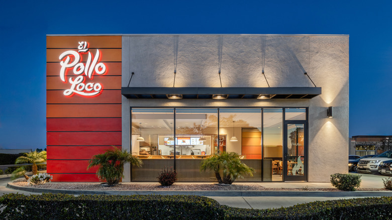 exterior shot of an El Pollo Loco, lit up at night