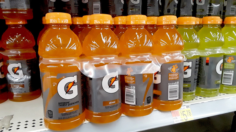 Various flavors of Gatorade on a supermarket shelf