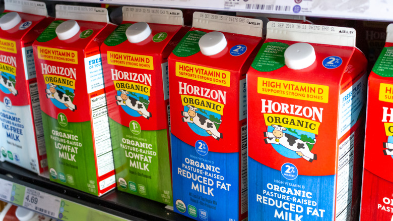 Types of Horizon organic milk on display at a supermarket