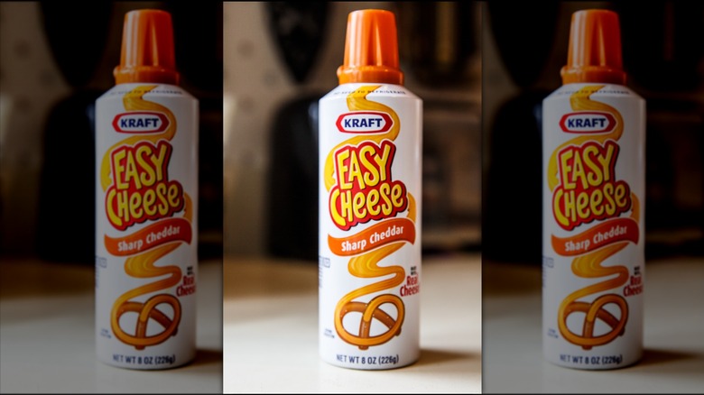 A container of Kraft Easy Cheese, mirrored
