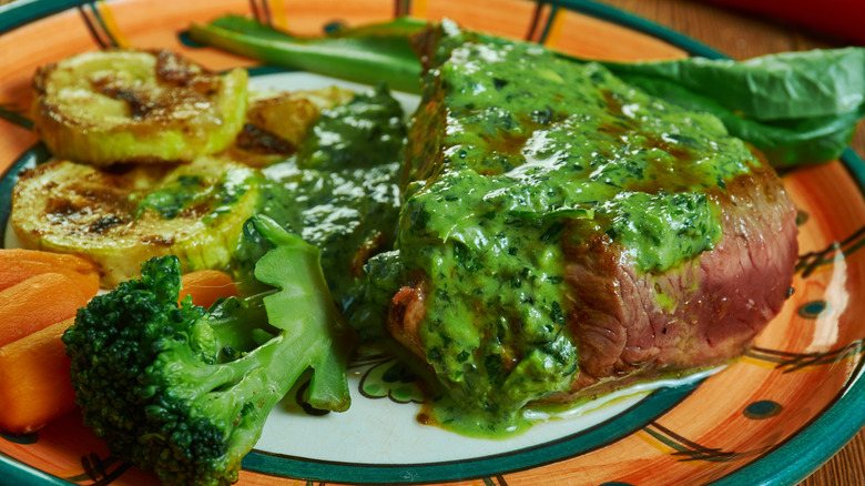 steak de burgo with vegetables on plate
