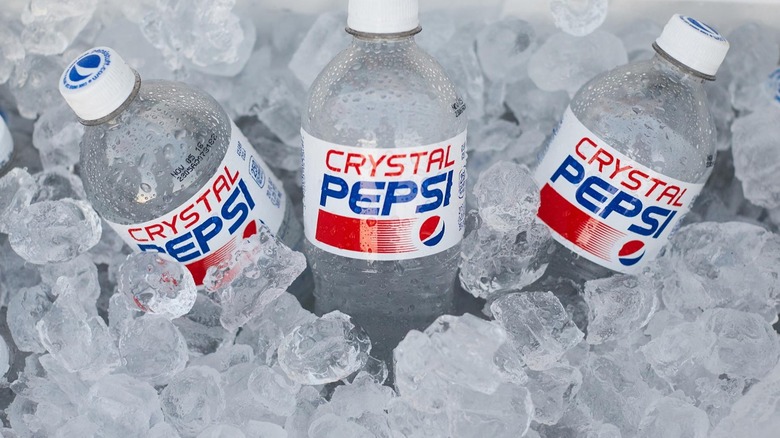 Plastic Bottles of Crystal Pepsi on ice