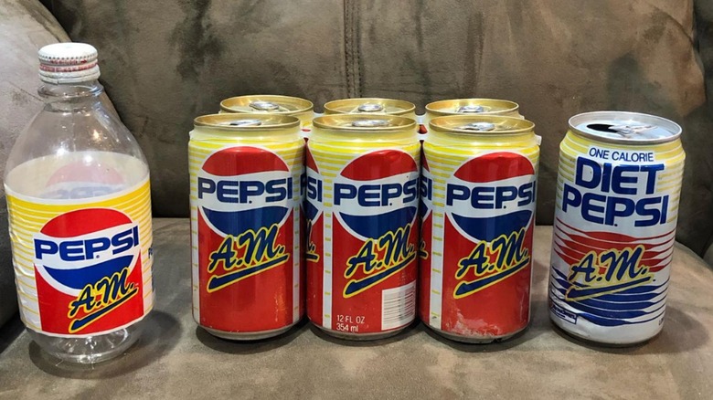 Cans and a bottle of Pepsi A.M.