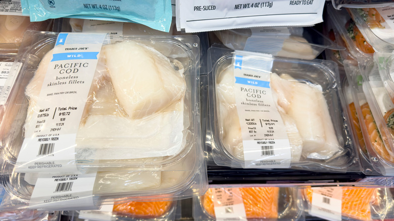 Packages of Trader Joe's Wild Caught Cod in the refrigerator case
