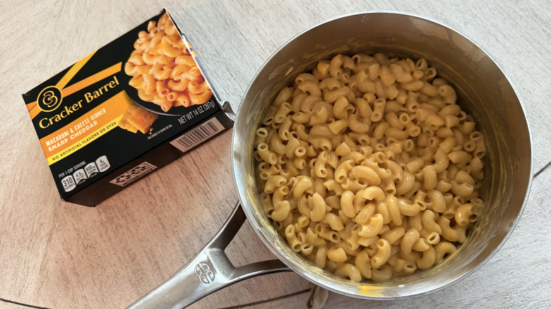 Box of Cracker Barrel and noodles in a pot