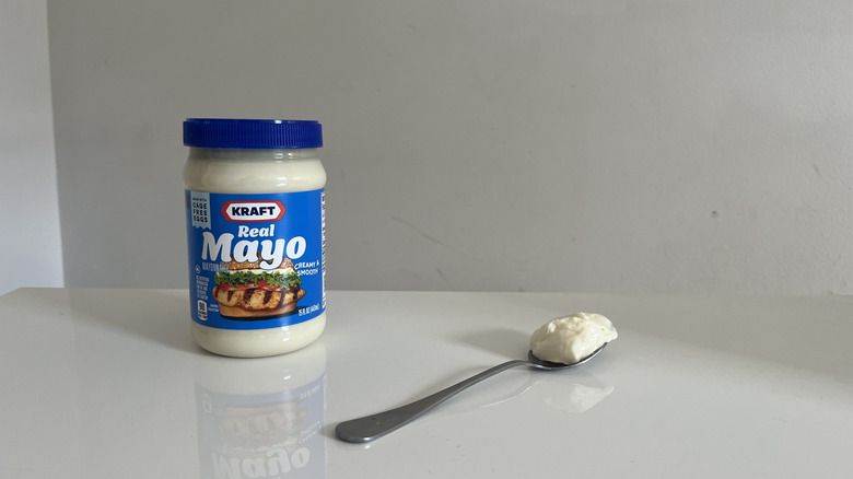 A jar of Kraft wayo sitting on a white table