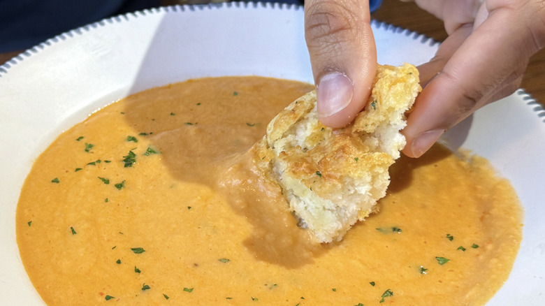 Dipping bread in lobster bisque at Red Lobster