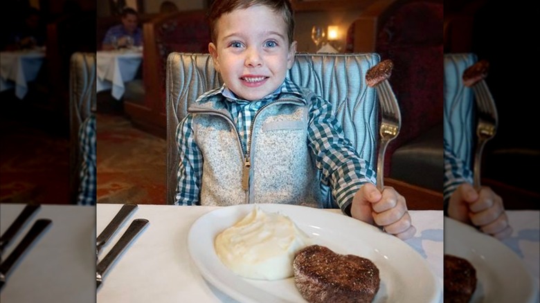 Child eating at Ruth's Chris Steak House