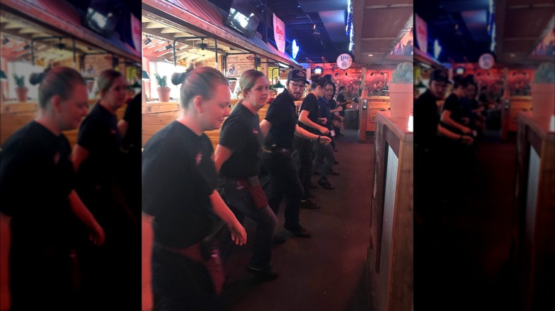 Texas Roadhouse staff line dancing