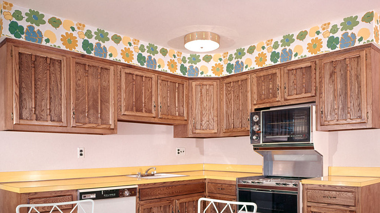 Floral wallpaper in a 1970s kitchen