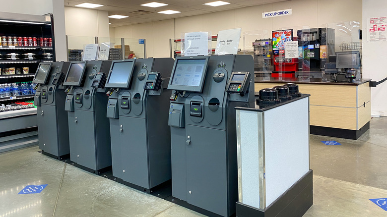 A Sam's Club cafe with kiosks for self-checkout