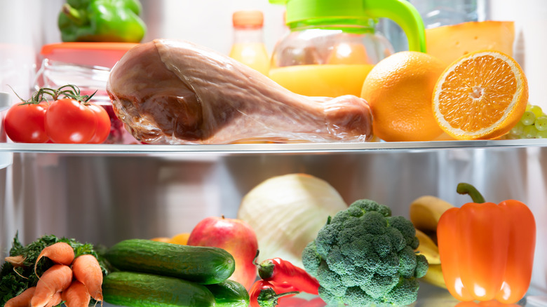 Fridge shelves filled with food