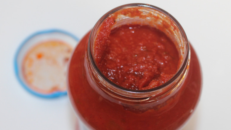 Open jar of pasta sauce