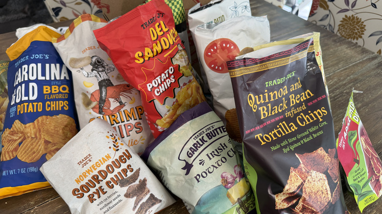 Open bags of Trader Joe's Chips on wooden table