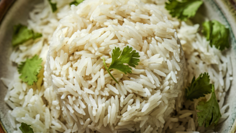 Cooked white basmati rice with herbs