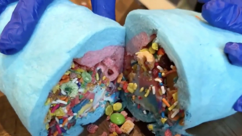 cotton candy burrito cut in half