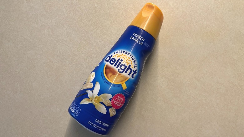 International Delight French Vanilla Coffee Creamer bottle on counter