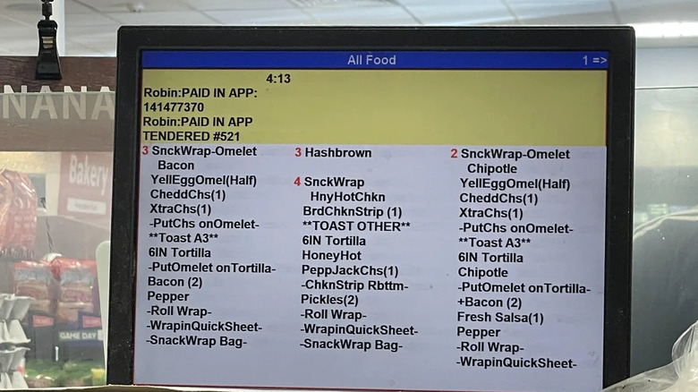 Order screen for Wawa deli workers with long list of snack wrap and hashbrown orders