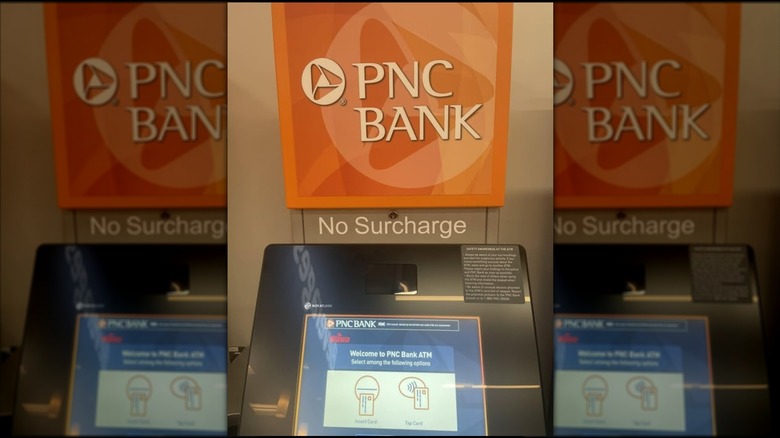 PNC Bank ATM inside a Wawa convenience store with No Surcharge sign