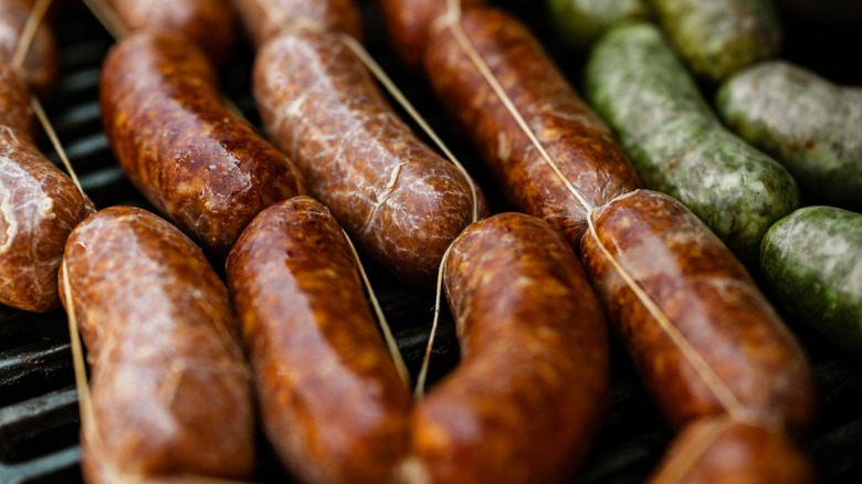 Up close view of sausage on a grill