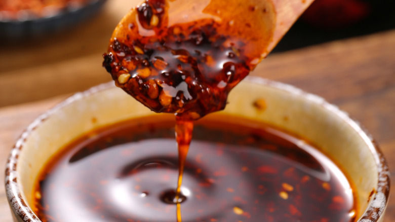 Up close view of chili oil in a white bowl
