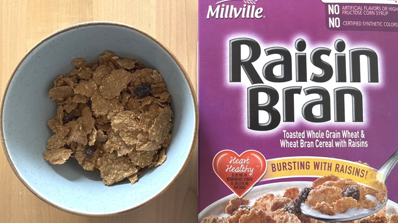 bowl of cereal with raisins next to box of Raisin Bran