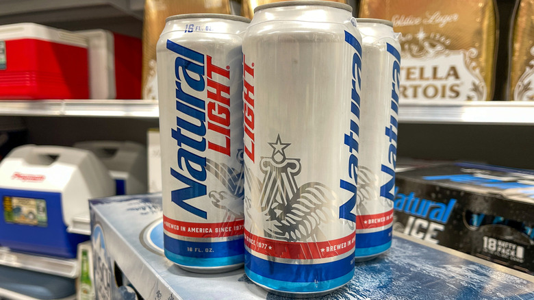 Cans of Natural Light in a store display