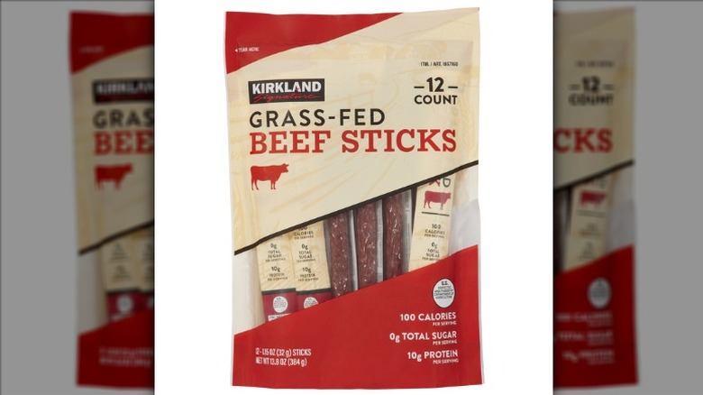 A package of Kirkland Signature Grass-fed Beef Sticks on a white background.