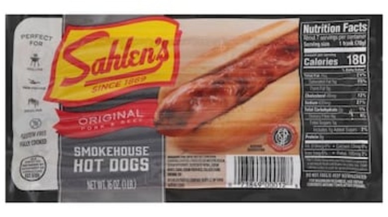 A package of Sahlen's original pork and beef hot dogs on a white background.
