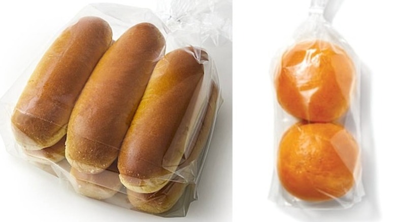 Packages of brioche hot dog and hamburger buns from the Publix bakery on a white background.