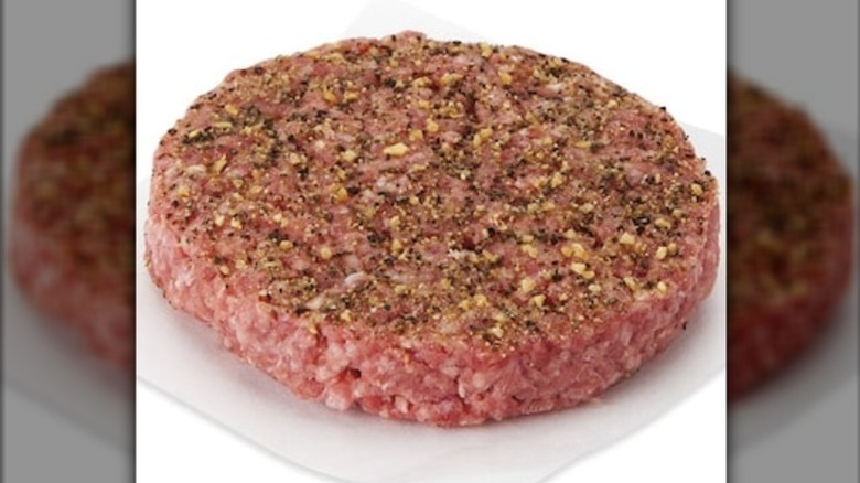 Publix steakhouse seasoned ground chuck burger on a white background.