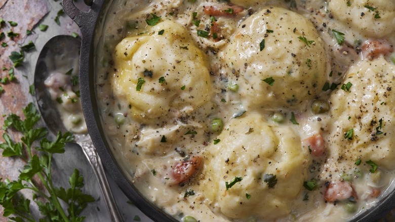 Creamy Chicken and Dumplings with Roast Chicken, Green Peas, Celery and Carrots