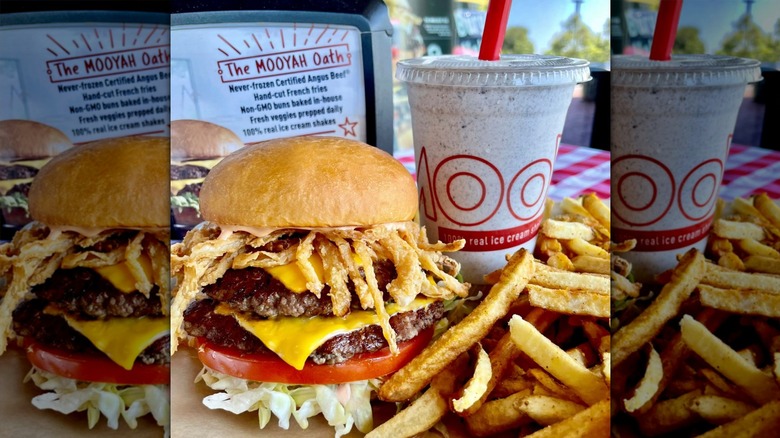 A Mooyah burger with fries and a shake