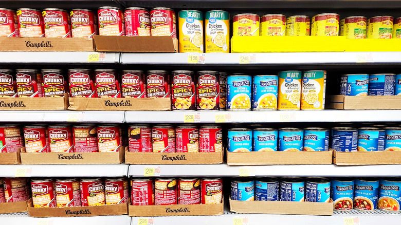 Can of Campbell's and Progresso next to each other in store