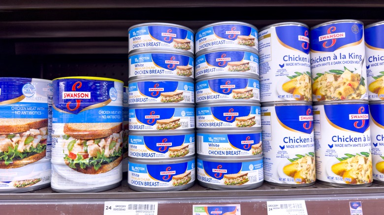 Can of chicken on store shelf