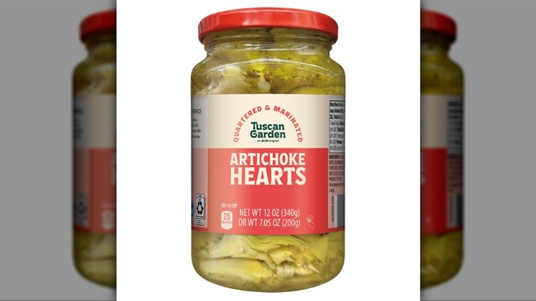 Jar of Tuscan Garden Quartered Marinated Artichoke Hearts on white background