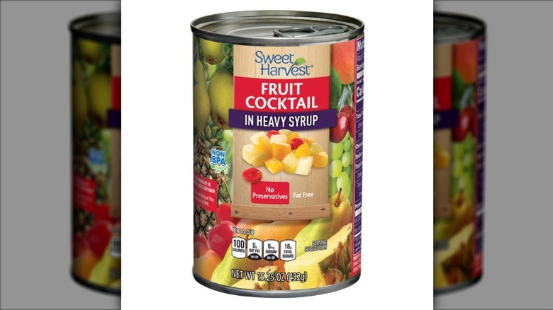 Can of Sweet Harvest Fruit Cocktail in Heavy Syrup from Aldi on a white background