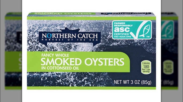 Box of a can of Northern Catch Smoked Oysters from Aldi on a white background