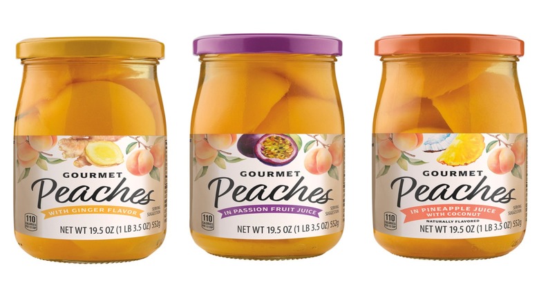 Three jars of Sweet Harvest Gourmet Peaches in ginger, passion fruit, and pineapple coconut flavors on white background
