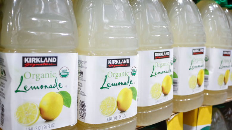 Row of jugs of Kirkland Signature lemonade at Costco