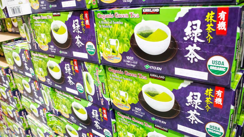 A view of several boxes of Kirkland Signature green tea on display at Costco