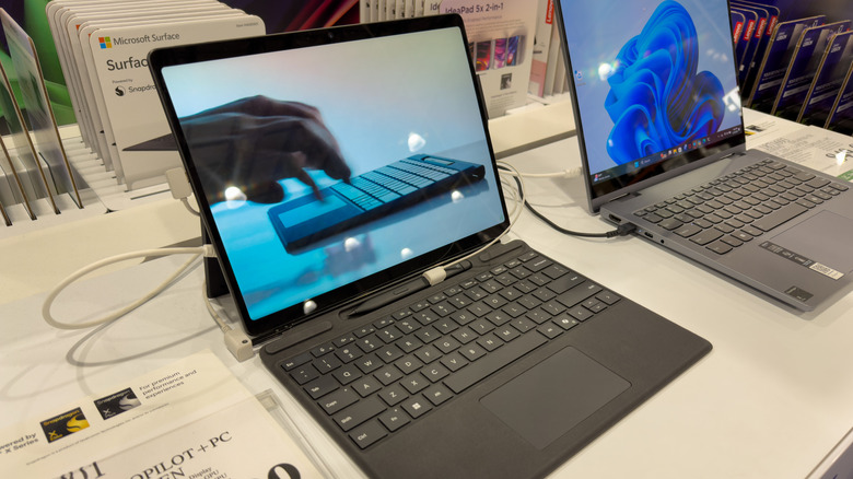 A display of computers in a Costco store