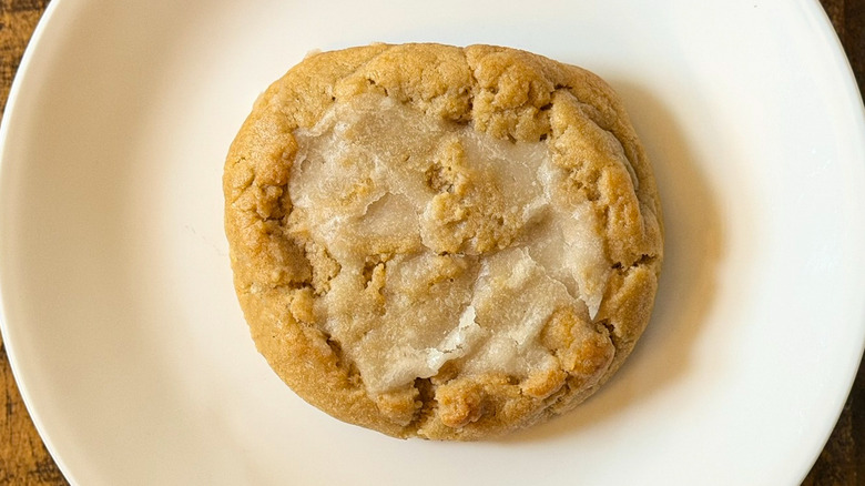 A Crumbl Kentucky Butter Cake Cookie on a white plate