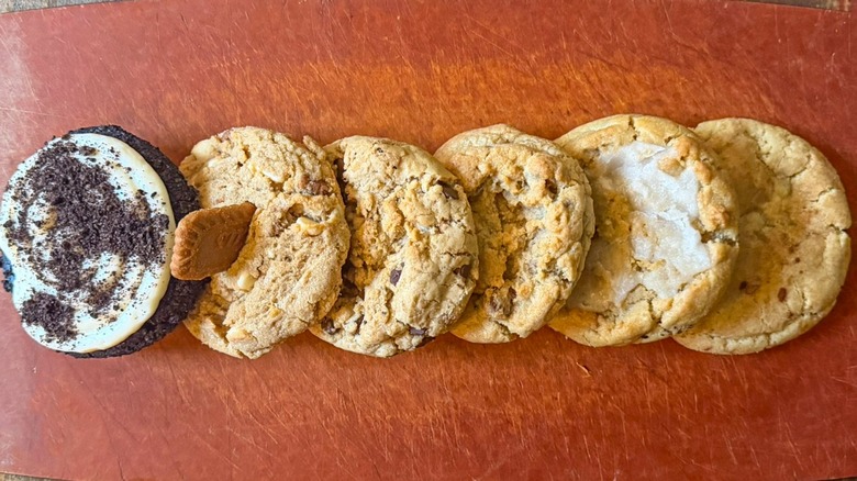 A row of cookies on display on a board