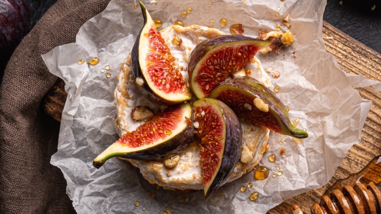 Brie and fresh figs on paper wrapper