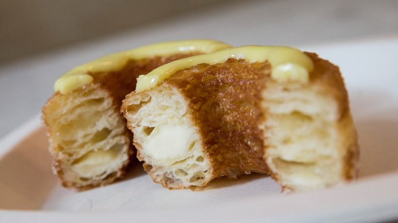 A cronut cut in half