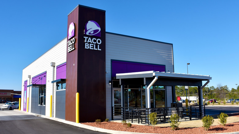 Taco Bell exterior with drive-thru on sunny day