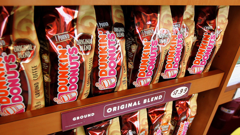 Bags of Dunkin' coffee in store display